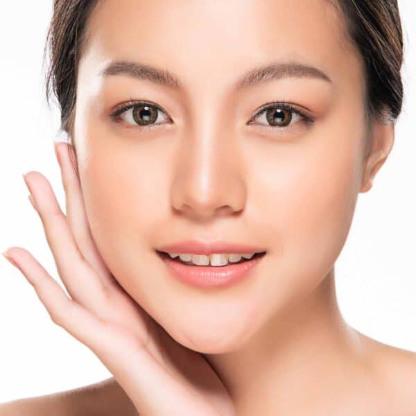 Beautiful Young Asian Woman with Clean Fresh Skin touch own face, Facial treatment, Cosmetology, beauty and spa,